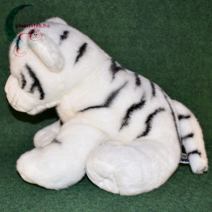 Hatalmas hófehér plüss tigris kölyök oldalról