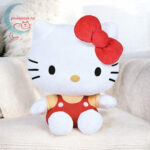 Hello Kitty plüss cica, piros ruhában a kanapén (14 cm)